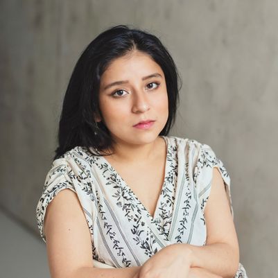 Mariela looking directly at the camera with a friendly expression
